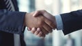 Macro Lens Close-Up: Executives Seal the Deal with Firm Handshake