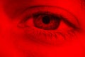 Macro on man eye expressing serious and expressionless expression Royalty Free Stock Photo