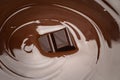 Macro of Melted dark or milk chocolate bar in swirl Royalty Free Stock Photo