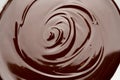 Macro of Melted milk or dark chocolate swirl background Royalty Free Stock Photo