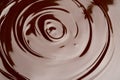 Macro of Melted milk or dark chocolate swirl background Royalty Free Stock Photo