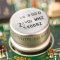 Macro of a 24 MHz Crystal Oscillator on a PCB Royalty Free Stock Photo