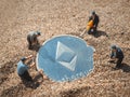 Macro miner figurines digging ground to uncover big shiny ethereum