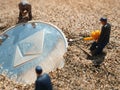Macro miner figurines digging ground to uncover big shiny ethereum