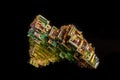 Macro of the mineral bismuth stone on a black background Royalty Free Stock Photo