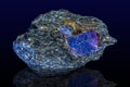 Macro mineral raw uncut blue sapphire crystal-close up Royalty Free Stock Photo