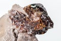 Macro of mineral Sphalerite stone on microcline on white background Royalty Free Stock Photo