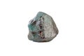 Macro mineral stone alexandrite bluish - green with fluorescent light on a white background