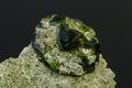 Macro mineral stone Andradite on a black background Royalty Free Stock Photo