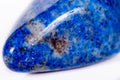 Macro mineral stone blue lapis lazuli afghanistan on white bac Royalty Free Stock Photo