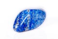 Macro mineral stone blue lapis lazuli afghanistan on white bac Royalty Free Stock Photo