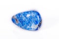 Macro mineral stone blue lapis lazuli afghanistan on white bac Royalty Free Stock Photo