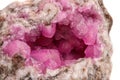 Macro mineral stone Cobalt Calcite rock on white background