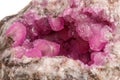 Macro mineral stone Cobalt Calcite rock on white background