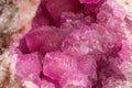 Macro mineral stone Cobalt Calcite rock on white background