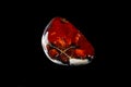 Macro mineral stone Cornelian on a black background