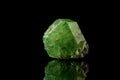 Macro mineral stone Demantoid on a black background Royalty Free Stock Photo