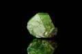 Macro mineral stone Demantoid on a black background Royalty Free Stock Photo