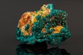 Macro mineral stone Dioptase on a gray background Royalty Free Stock Photo