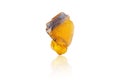 Macro mineral stone Fluorite yellow and blue color on a white background