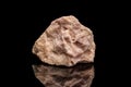 Macro mineral stone Hackmanite on a black background Royalty Free Stock Photo