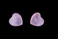 Macro mineral stone Heart pink quartz on a black background Royalty Free Stock Photo