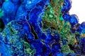 Macro mineral stone malachite with azurite on white background