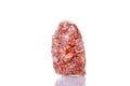 Macro mineral stone orange calcite on a white background Royalty Free Stock Photo