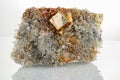 Macro mineral stone Quartz Pyrite on a white background