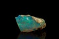 Macro mineral stone rare and beautiful opals on a black background Royalty Free Stock Photo