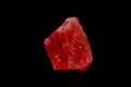 Macro mineral stone Rhodochrosite on a black background