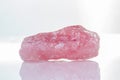Macro mineral stone rose quartz on a white background Royalty Free Stock Photo