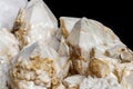 Macro mineral stone Snow quartz with calcite on a black background Royalty Free Stock Photo