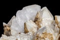 Macro mineral stone Snow quartz with calcite on a black background Royalty Free Stock Photo