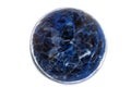 Macro mineral stone Sodalite ball on white background Royalty Free Stock Photo