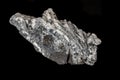 Macro mineral stone Stibnite quartz on a black background Royalty Free Stock Photo