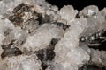 Macro mineral stone Stibnite quartz on a black background Royalty Free Stock Photo