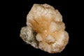 Macro mineral stone Stilbite on Apophyllite on a black background