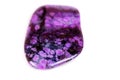 Macro mineral stone sugilite on white background