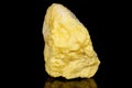 Macro mineral stone Sulfur on black background Royalty Free Stock Photo