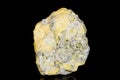 Macro mineral stone Sulfur on black background Royalty Free Stock Photo