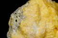 Macro mineral stone Sulfur on black background Royalty Free Stock Photo