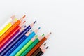 Macro multicolored pencils on a white background