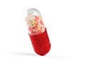 Macro of one red medical capsule isolated