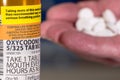 Macro of oxycodone opioid tablet bottle