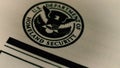 Macro Pan up on Homeland Security logo on US immigration / naturalization form