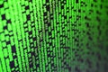 Macro of password selection on the monitor of the office computer. The concept of hacking the protection of a personal data keeper