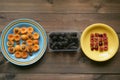 Macro pattern from apricots and cherries on a plates Royalty Free Stock Photo