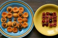 Macro pattern from apricots and cherries on a plates Royalty Free Stock Photo