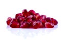 Macro peeled ripe pomegranate fruit with water droplets